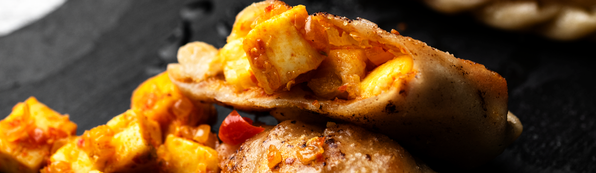 paneer achari momos.png